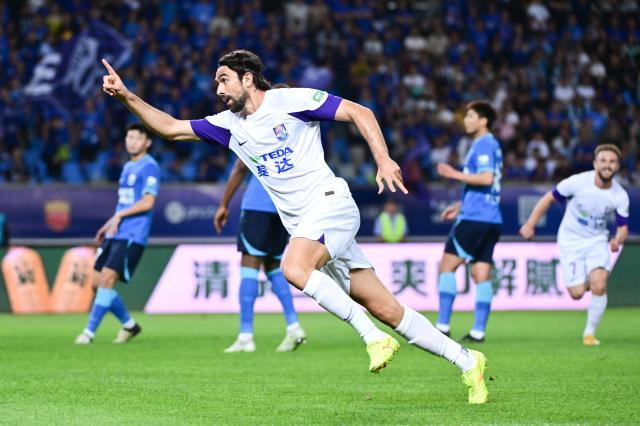 mk体育APP-【中超】孔帕尼奥戴帽阿代米造3球 津门虎4比2沧州